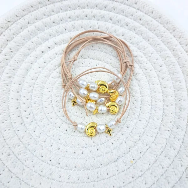 Μαρτυρικό βραχιόλι με κοχύλι και πέρλες KYMI