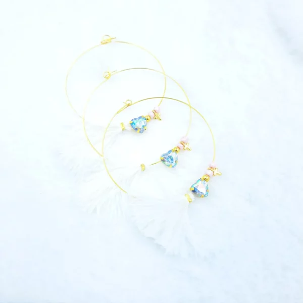 Μαρτυρικό βραχιόλι με κρυστάλλινη καρδιά και φτερό kymi